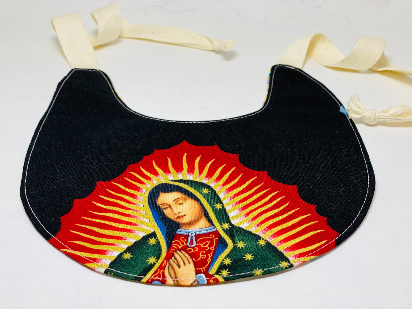 Bib - STRING -  La Virgen (on black)